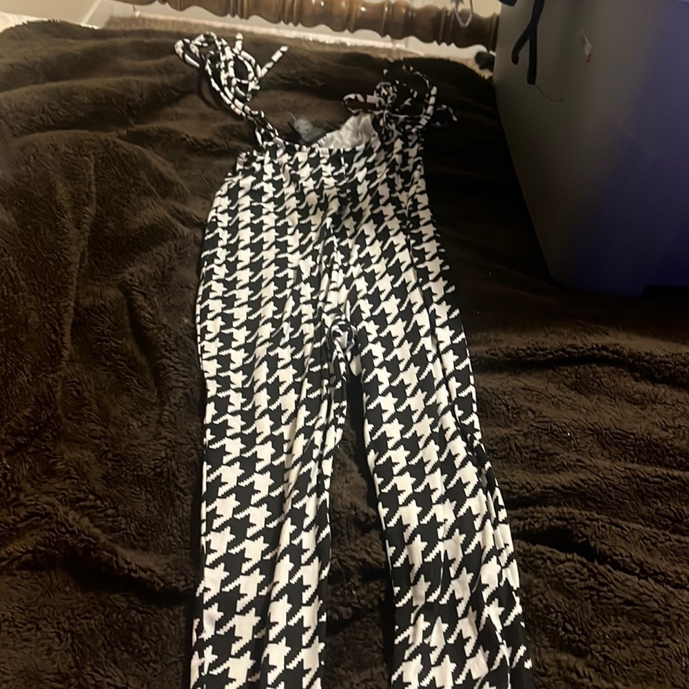 Black and white jumpsuit with tyeable straps